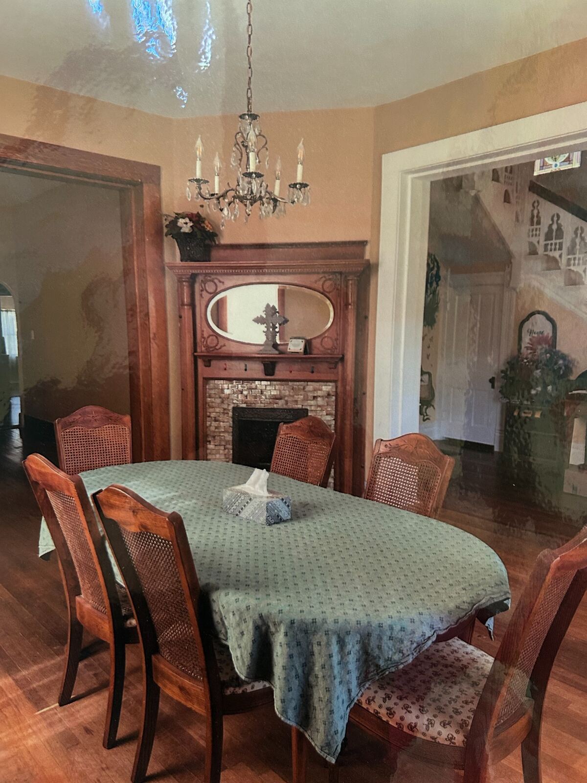 Dining room with fireplace and table